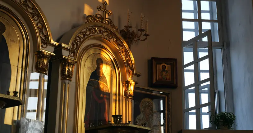 Tyumen, Russia - August 22, 2024: Orthodox icons bathed in sunlight symbolize devotion and spiritual connection. Golden glow enhances their sacred significance, inspiring peace and reverence.